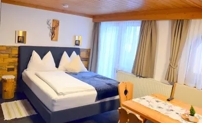 Ein Bett oder Betten in einem Zimmer der Unterkunft Haus Sonnleiten