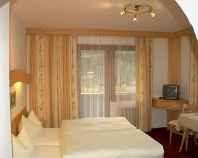Ein Bett oder Betten in einem Zimmer der Unterkunft Gästehaus Elfriede
