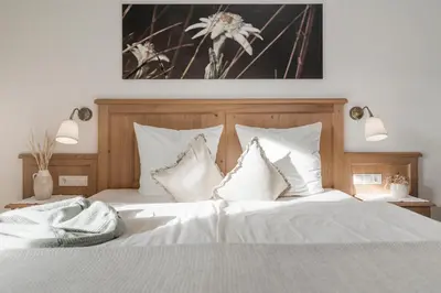 Ein Bett oder Betten in einem Zimmer der Unterkunft Restaurant Gästehaus Wiesenheim