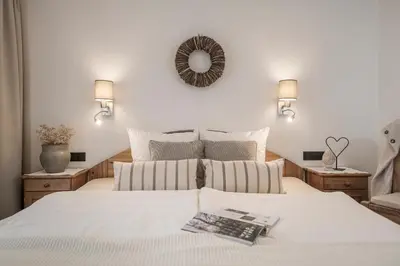 Ein Bett oder Betten in einem Zimmer der Unterkunft Restaurant Gästehaus Wiesenheim