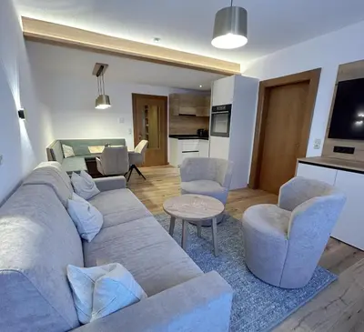 Ein Sitzbereich in der Unterkunft Appartement Christian