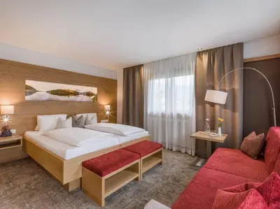 Ein Bett oder Betten in einem Zimmer der Unterkunft Hotel Post