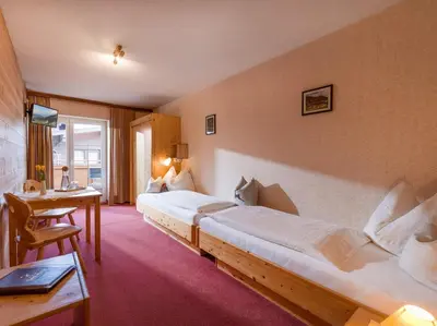 Ein Bett oder Betten in einem Zimmer der Unterkunft Hotel Post