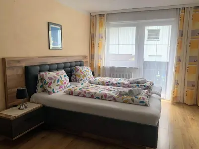 Ein Bett oder Betten in einem Zimmer der Unterkunft Appartements Konrad