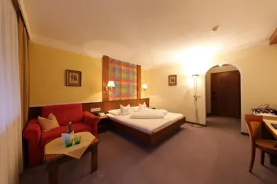 Ein Bett oder Betten in einem Zimmer der Unterkunft Hotel Lamark