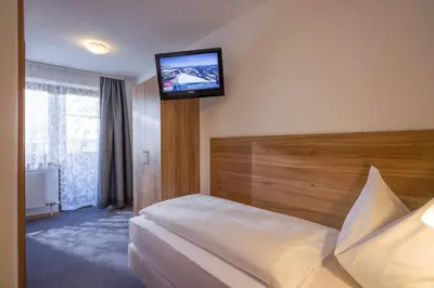 Ein Bett oder Betten in einem Zimmer der Unterkunft Frühstückspension Sport Mayr