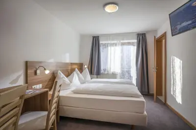 Ein Bett oder Betten in einem Zimmer der Unterkunft Frühstückspension Sport Mayr