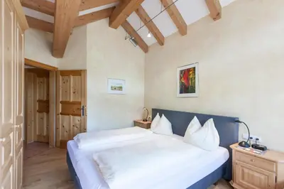 Ein Bett oder Betten in einem Zimmer der Unterkunft Noichl’s Hotel Garni