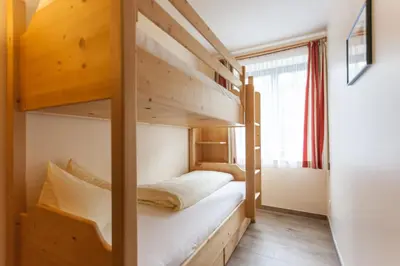Ein Bett oder Betten in einem Zimmer der Unterkunft Amadeus Appartement