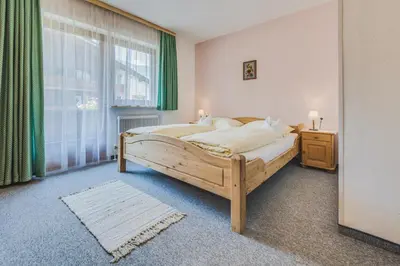 Ein Bett oder Betten in einem Zimmer der Unterkunft Haus Kristall