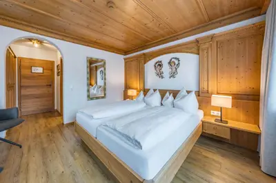 Ein Bett oder Betten in einem Zimmer der Unterkunft Hotel Englhof