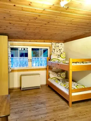 Ein Bett oder Betten in einem Zimmer der Unterkunft Ferienwohnungen Birkleiten