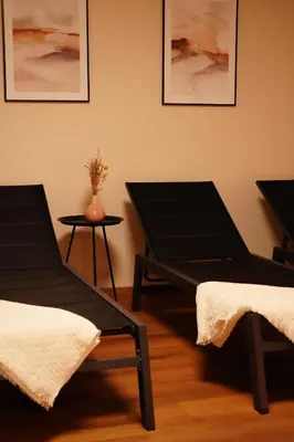 Ein Sitzbereich in der Unterkunft Aparthotel Iris