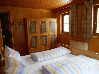 Ein Bett oder Betten in einem Zimmer der Unterkunft Ferienwohnung Trattenhaus