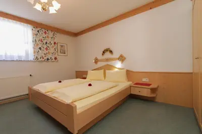 Ein Bett oder Betten in einem Zimmer der Unterkunft Landhaus Gensbichler