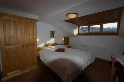 Ein Bett oder Betten in einem Zimmer der Unterkunft Frühstückspension & Appartements Eugenie