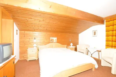 Ein Bett oder Betten in einem Zimmer der Unterkunft Frühstückspension & Appartements Eugenie