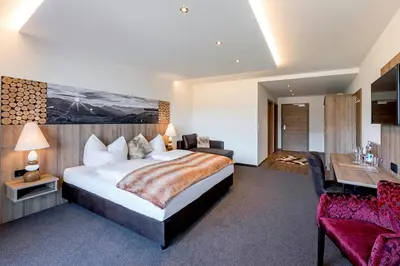 Ein Bett oder Betten in einem Zimmer der Unterkunft Leamwirt
