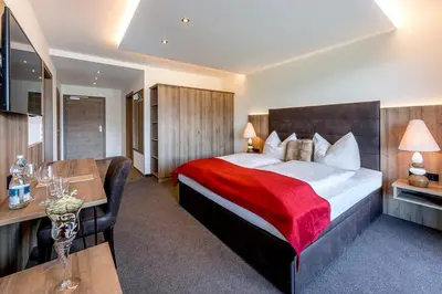 Ein Bett oder Betten in einem Zimmer der Unterkunft Leamwirt