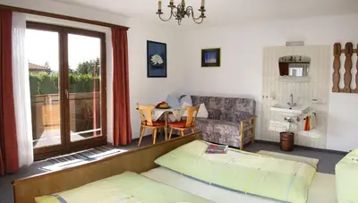 Ein Bett oder Betten in einem Zimmer der Unterkunft Haus Jochblick Familie Loinger