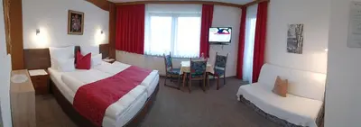 Ein Bett oder Betten in einem Zimmer der Unterkunft Gästehaus Burgi