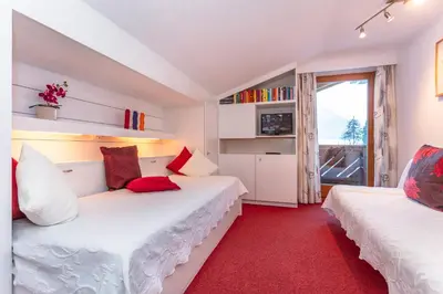 Ein Bett oder Betten in einem Zimmer der Unterkunft Bergheim Komfort Ferienwohnungen