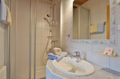 Ein Badezimmer in der Unterkunft Pension Gieringer