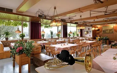 Ein Restaurant oder anderes Speiselokal in der Unterkunft Gasthof Mairwirt