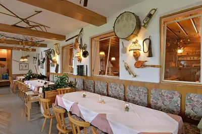 Ein Restaurant oder anderes Speiselokal in der Unterkunft Gasthof Mairwirt