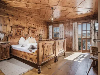 Ein Bett oder Betten in einem Zimmer der Unterkunft Kinderbauernhof Scharrerhof