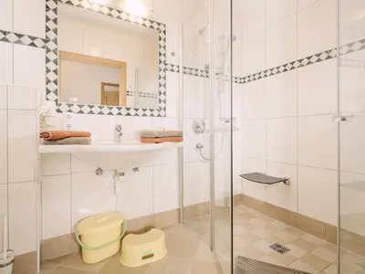 Ein Badezimmer in der Unterkunft Kinderbauernhof Scharrerhof