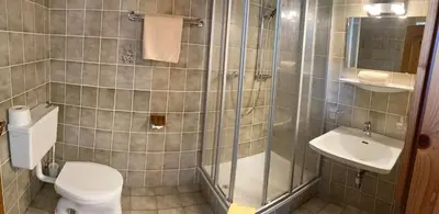 Ein Badezimmer in der Unterkunft Hotel-Pension Heike