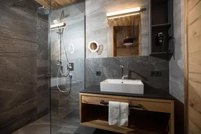 Ein Badezimmer in der Unterkunft Stadl Lofts Plattenalm - Premiumchalets - Zillertal - Tirol - Salzburg