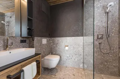 Ein Badezimmer in der Unterkunft Stadl Lofts Plattenalm - Premiumchalets - Zillertal - Tirol - Salzburg