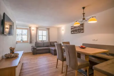 Ein Sitzbereich in der Unterkunft Appartement Reischerhof