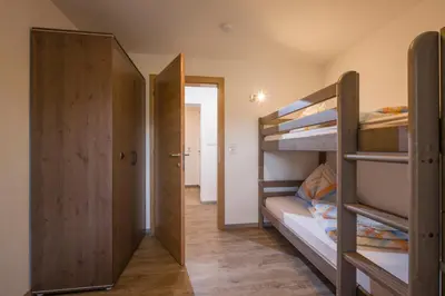 Ein Bett oder Betten in einem Zimmer der Unterkunft Ferienwohnung Lederer