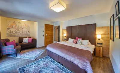 Ein Bett oder Betten in einem Zimmer der Unterkunft Fuchs und Gretl