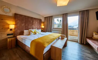 Ein Bett oder Betten in einem Zimmer der Unterkunft Fuchs und Gretl