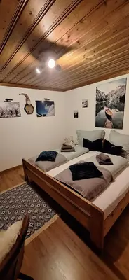 Ein Bett oder Betten in einem Zimmer der Unterkunft Apartment Unterhollenau