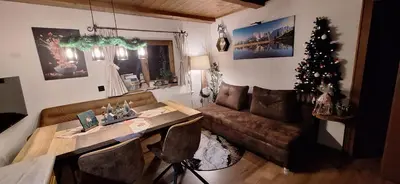 Ein Sitzbereich in der Unterkunft Apartment Unterhollenau