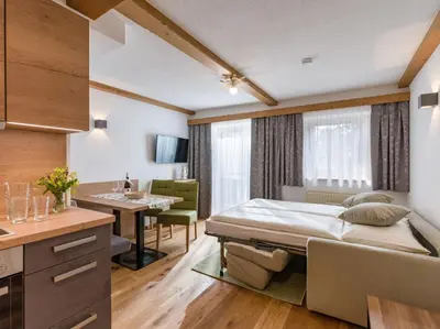 Ein Bett oder Betten in einem Zimmer der Unterkunft Pension Hinterholzer