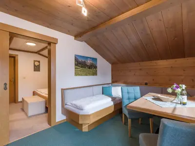 Ein Bett oder Betten in einem Zimmer der Unterkunft Pension Hinterholzer
