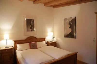 Ein Bett oder Betten in einem Zimmer der Unterkunft Ferienwohnung Angerer