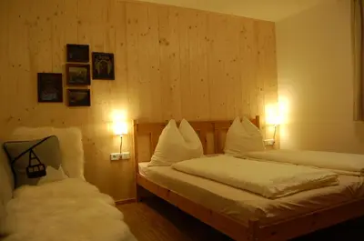 Ein Bett oder Betten in einem Zimmer der Unterkunft Landhaus Neussl