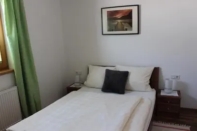Ein Bett oder Betten in einem Zimmer der Unterkunft Ferienwohnung Hollaus Elisabeth