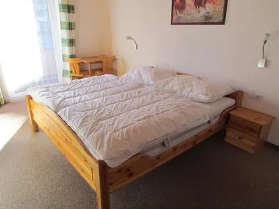 Ein Bett oder Betten in einem Zimmer der Unterkunft Landhaus Kröll