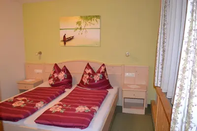 Ein Bett oder Betten in einem Zimmer der Unterkunft Bio Angererhof