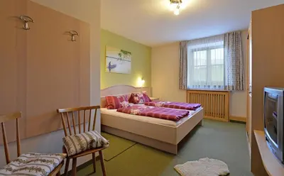 Ein Bett oder Betten in einem Zimmer der Unterkunft Bio Angererhof