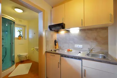 Ein Badezimmer in der Unterkunft Ferienhaus AB
