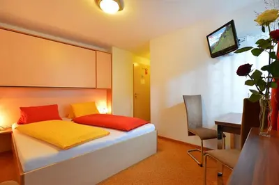 Ein Bett oder Betten in einem Zimmer der Unterkunft Ferienhaus AB